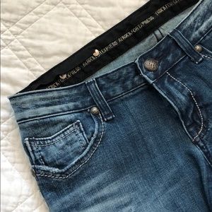 Express detailed flared jeans